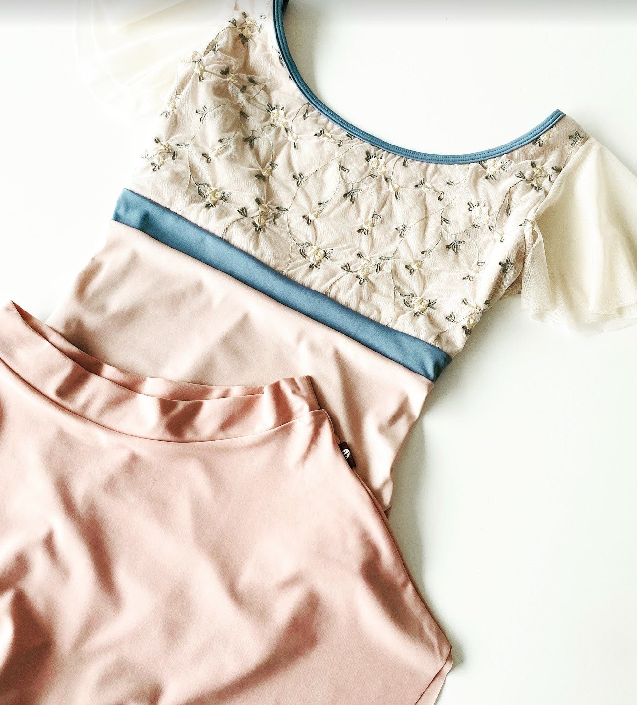 Rose Bud Embroidered Fluted Sleeve LeotardPink Rose Bud Embroidered Fluted Sleeve Leotard#mLeotardTHE COLLECTIVE DANCEWEAR