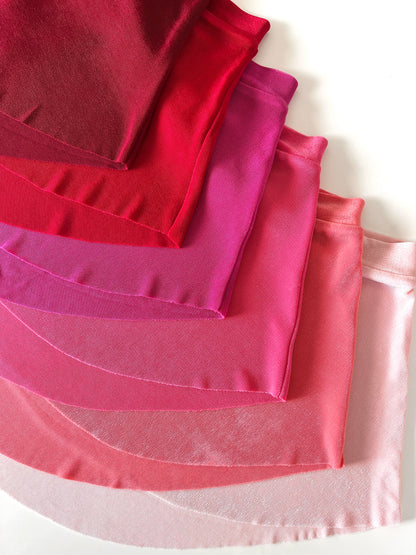 Bullet pointe ballet sab skirts in shades of Pink and red from The Collective Dancewear 