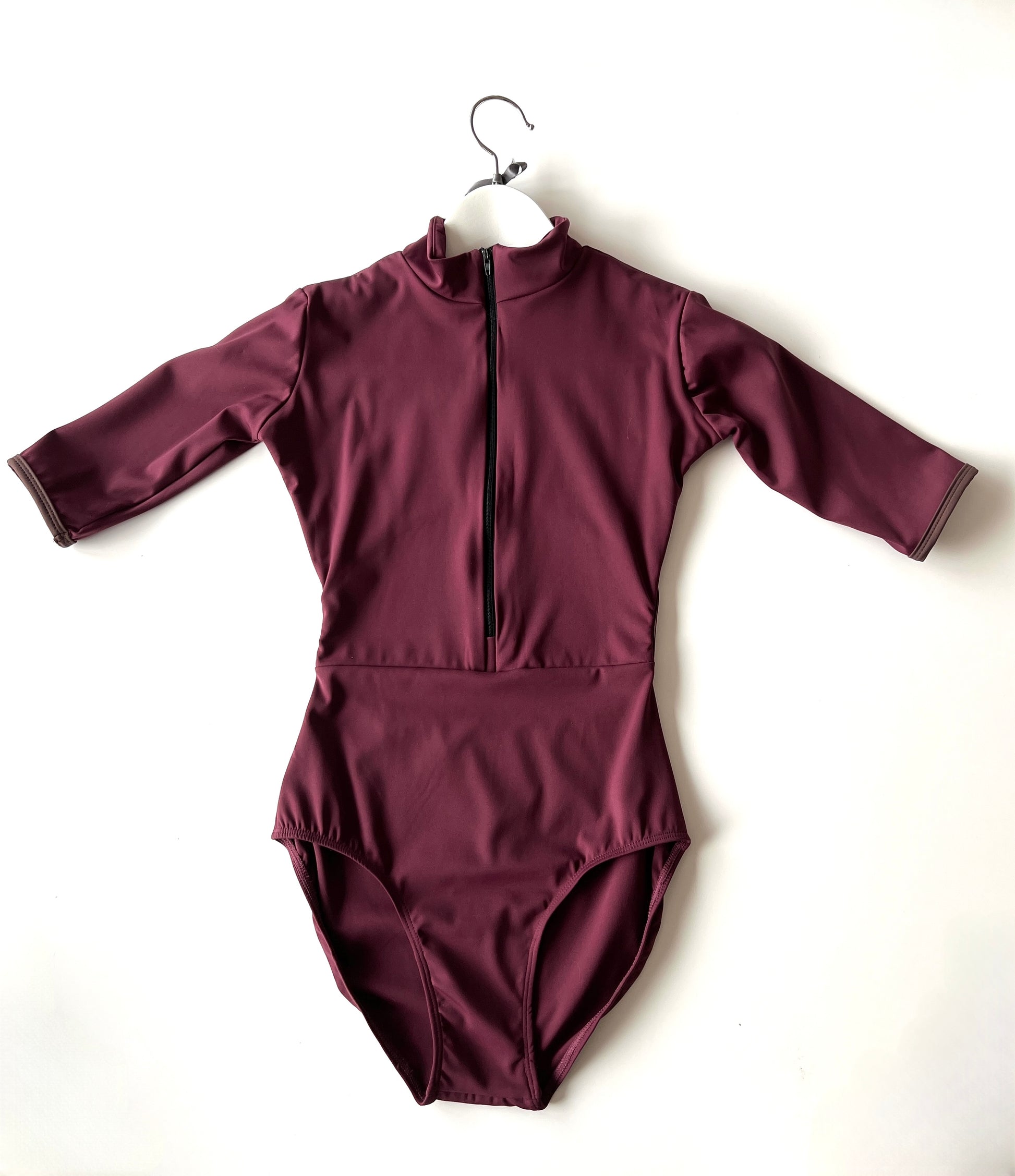 Zip up Leotard in burgundy with open back sold by The Collective Dancewear