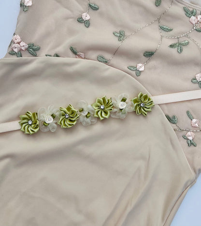 Cream organza and green satin flower with diamond in the middle bun wrap sold by The Collective Dancewear
