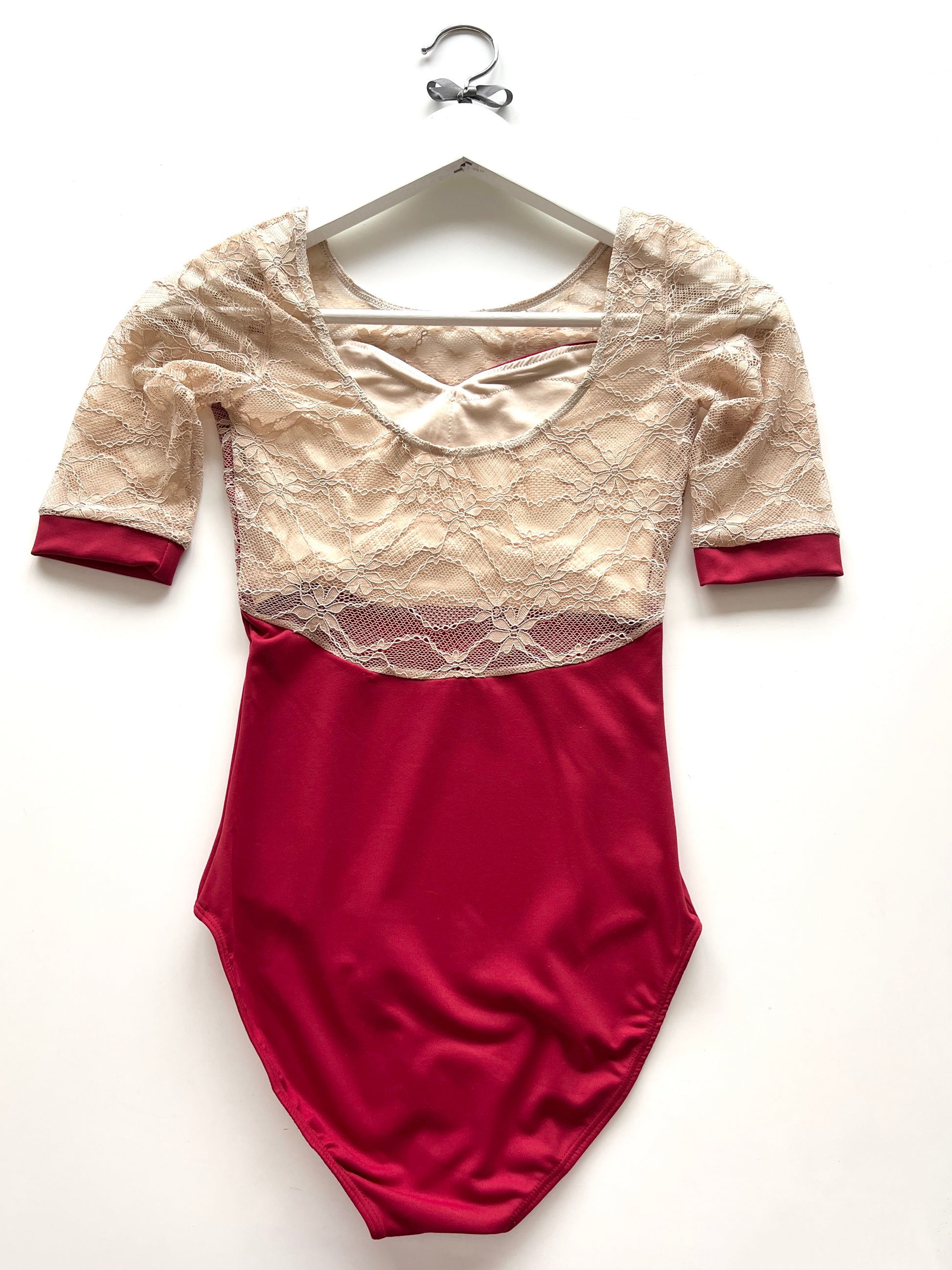 Lace sleeve leotard in red from The Collective Dancewear