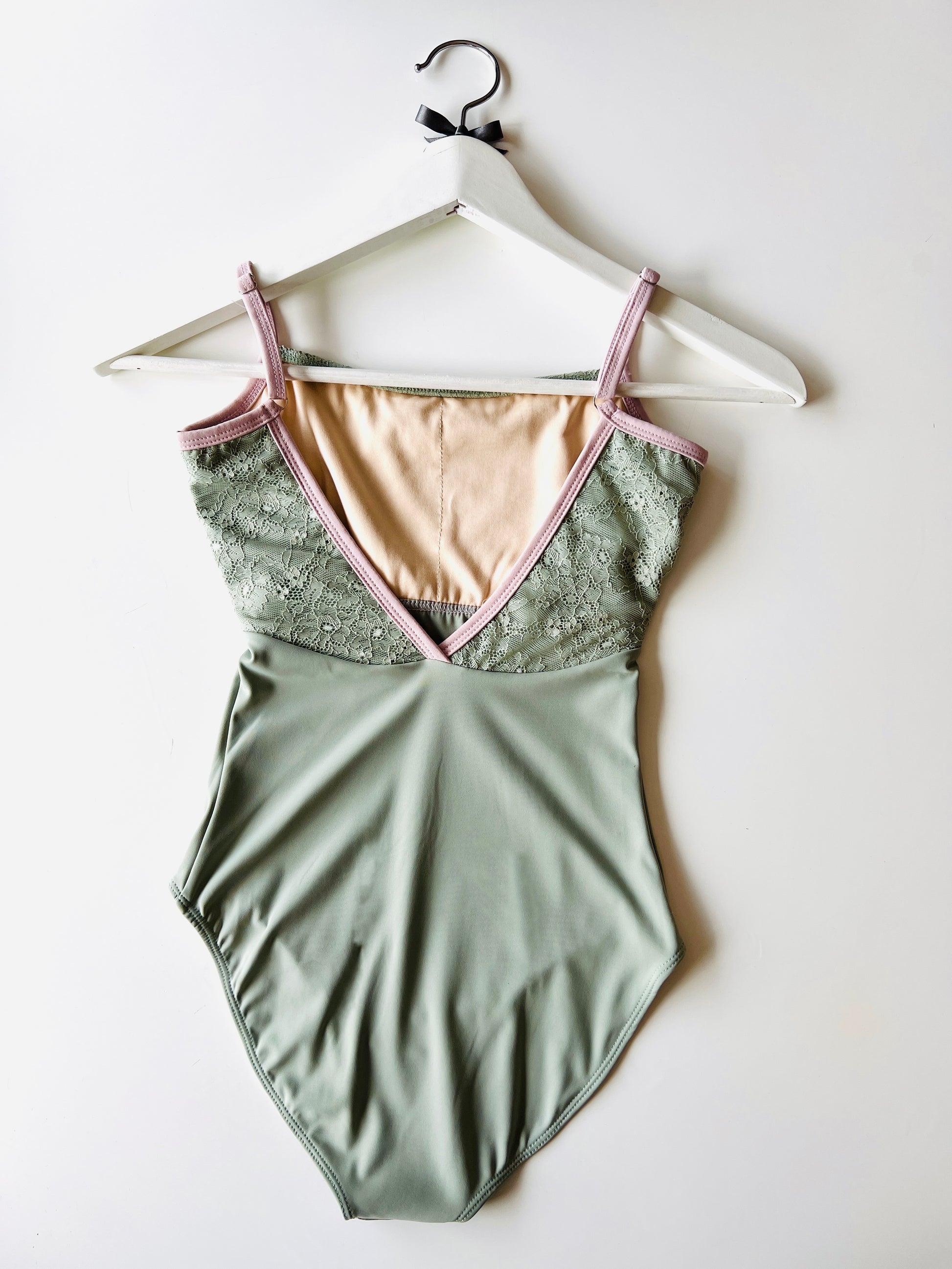Lace top ballet leotard in sage green and contrasting lilac from The Collective Dancewear