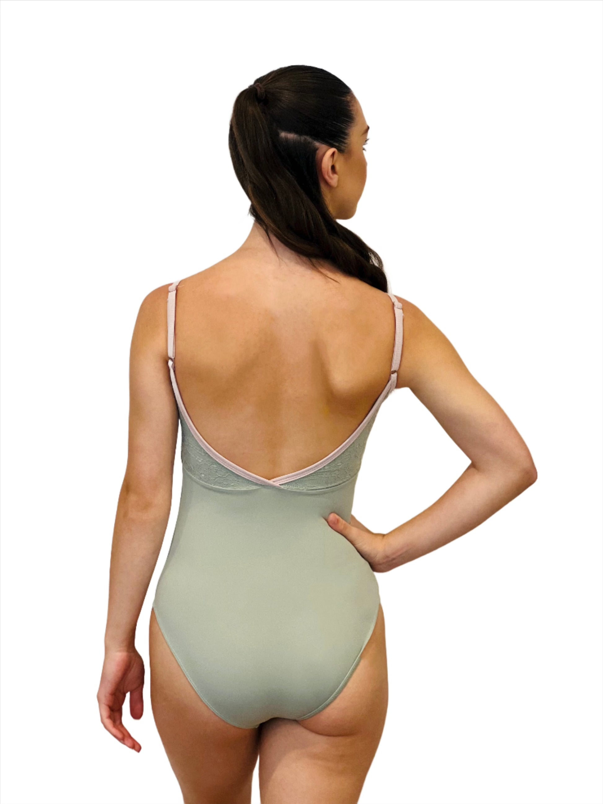 Lace top ballet leotard in sage green and contrasting lilac from The Collective Dancewear