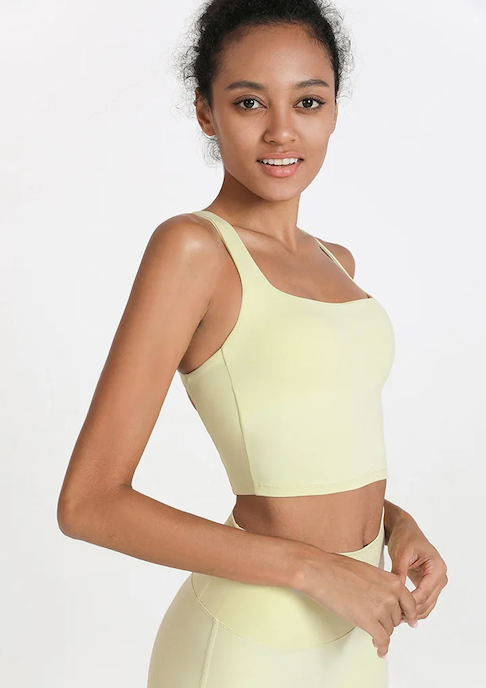 Cross back top with thick straps in pastel yellow from The Collective Dancewear