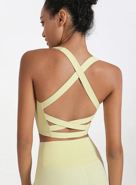Cross back top with thick straps in pastel yellow from The Collective Dancewear