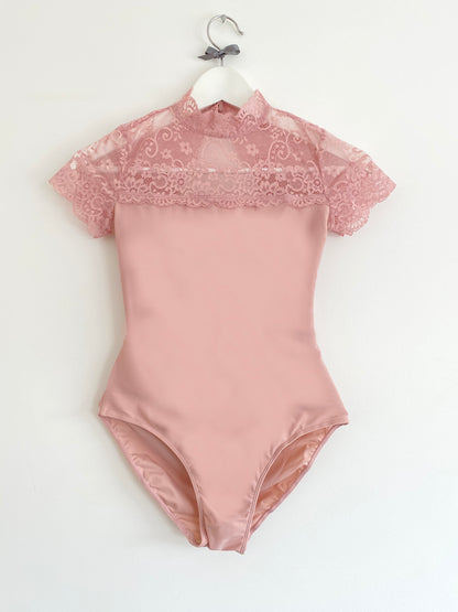 Ballet leotard with lace top and cap sleeves and two buttons from the Collective Dancewear Dusky Pink
