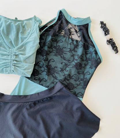 The High Neck Lace Leotard Sea Green and Black from The Collective Dancewear. Dance outfit inspo