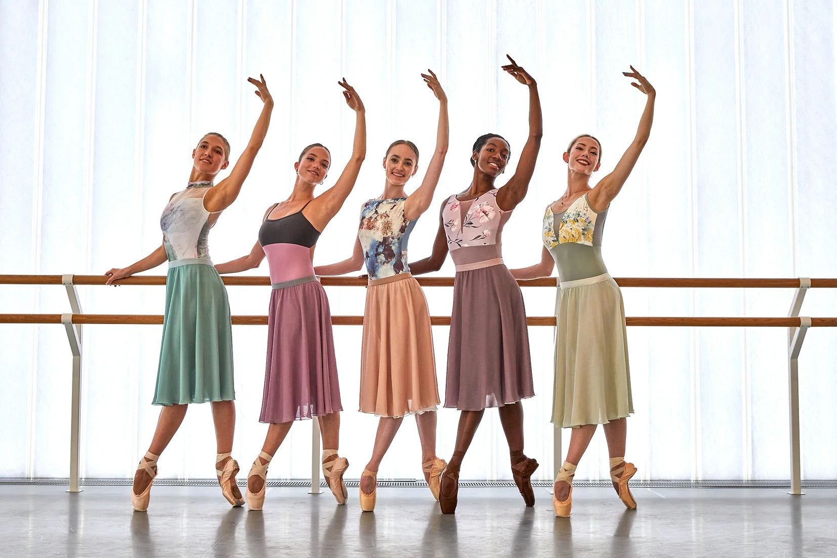 Dancers from English National Ballet in The Collective Dancewear leotards and Ballet skirts by Lucinda skirts. Photo by Szabina Biro. Dancers Emily Suzuki, Chloe Keneally, Ivana Bueno, Precious Adams and Lucinda  Strachan