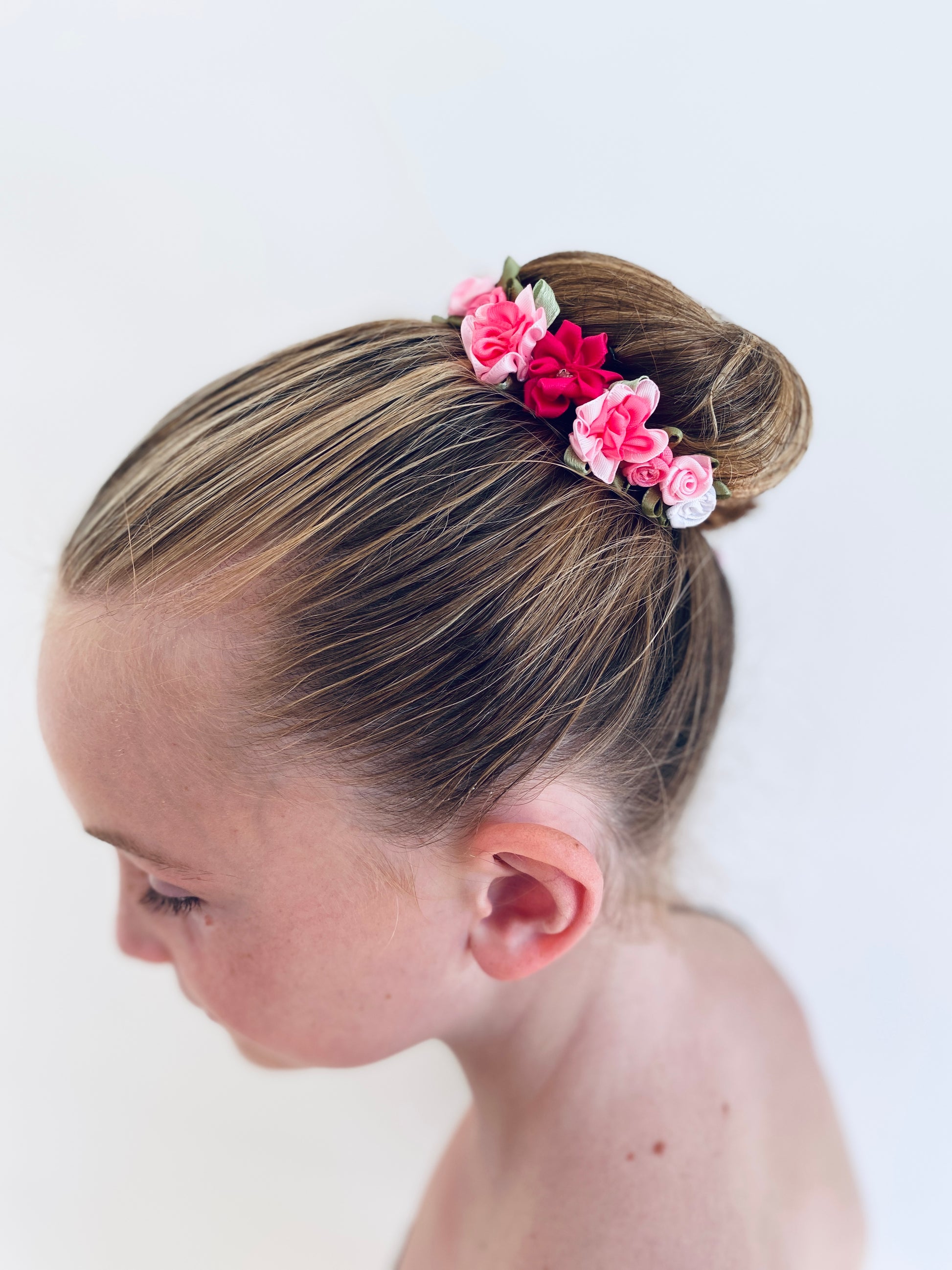 Bunwrap / hair accessory for your ballet bun from The Collective Dancewear in pink and white