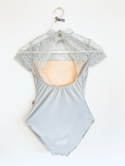 Ballet leotard with lace top and cap sleeves and two buttons in dusky green from The Collective Dancewear 