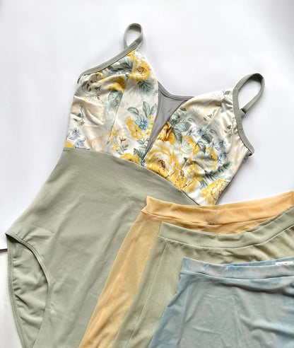 V-mesh camisole leotard in sage green with yellow floral print from The Collective Dancewear collaboration with Ballet Skirts By Lucinda