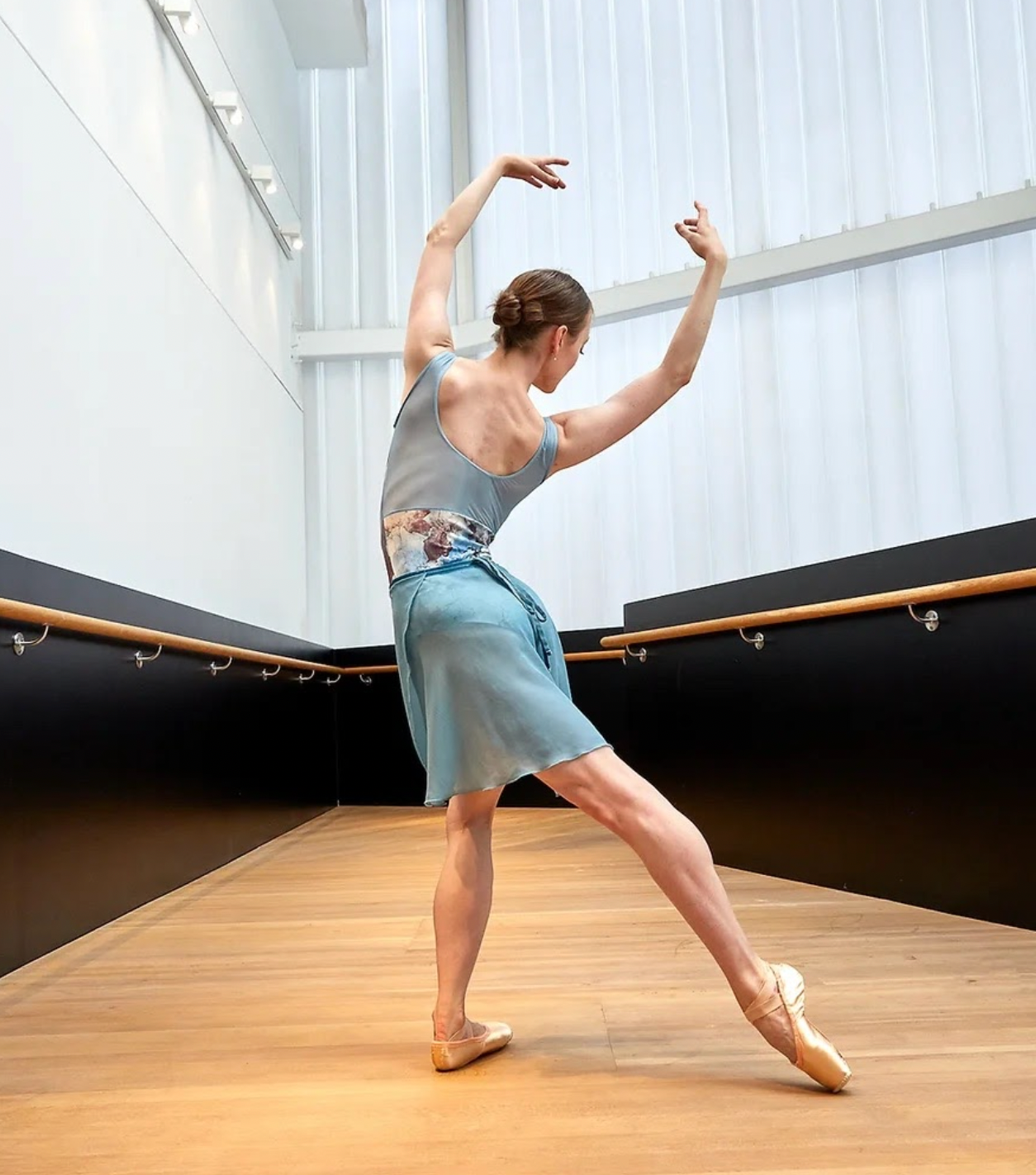 Leotard in blue, white and bronze abstract pattern. modern, cool different from The Collective Dancewear collaboration with Ballet Skirts By Lucinda. Chloe Keneally photographed by Szabrina Biro