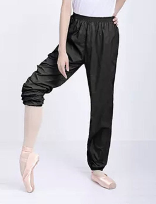 Black trash pants / sauna pants / warmup pants for dancers from The Collective Dancewear