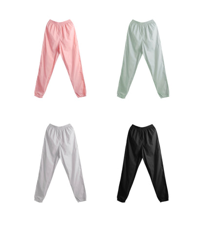 pink trash pants / sauna pants / warmup pants for dancers from The Collective Dancewear also available in pistachio green, pale grey and black 