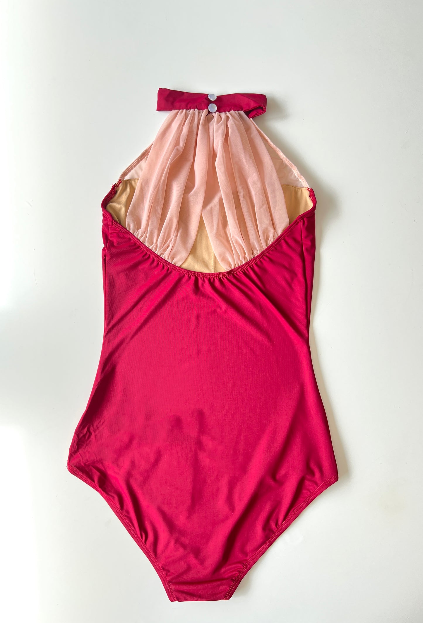 Halterneck leotard with Sweetheart neckline and ruched mesh in red and pink from The Collective Dancewear 