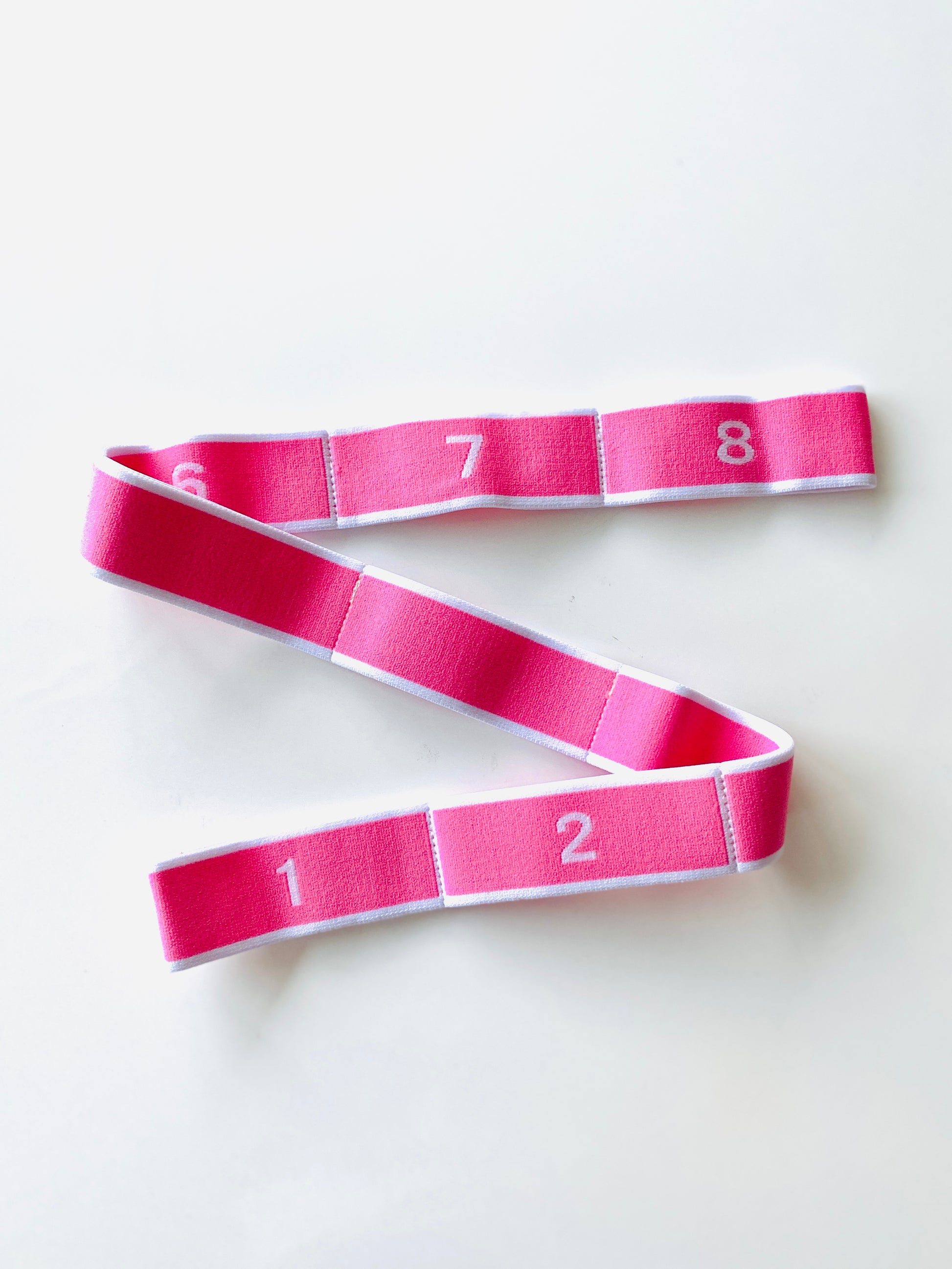 Pink stretchy flexibility band for strengthening and conditioning training from The Collective Dancewear