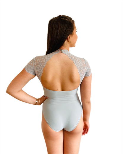 Ballet leotard with lace top and cap sleeves and two buttons from the Collective Dancewear Dusky Green