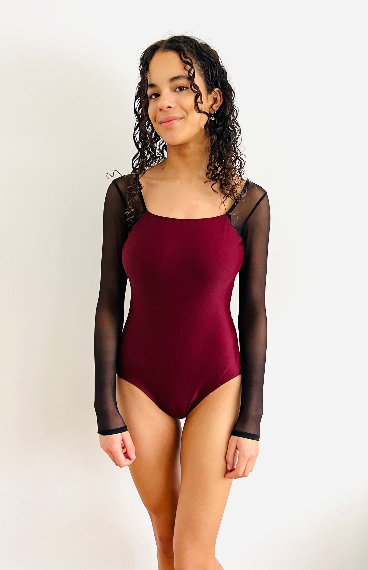 Margaux long sleeve leotard in maroon, red vine with black from The Collective Dancewear 