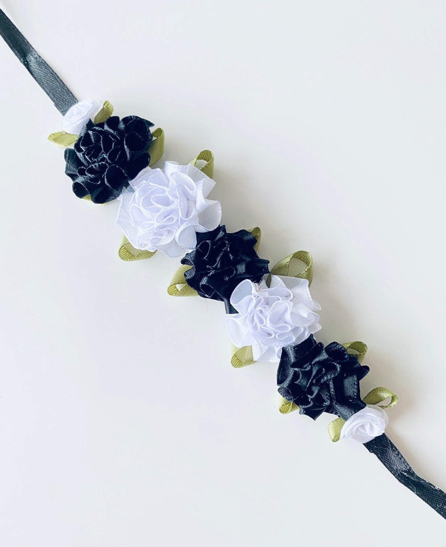 hand made bunwrap from the collective dancewear. black and white carnations