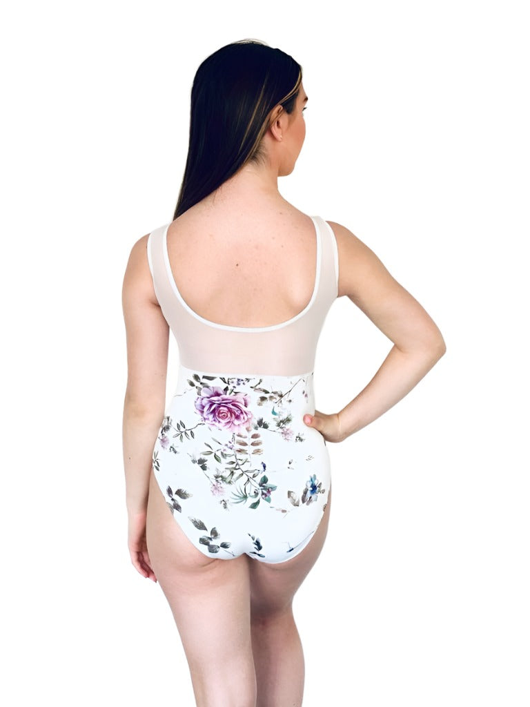 Beautiful leotard with dainty floral pattern on white background from The Collective Dancewear